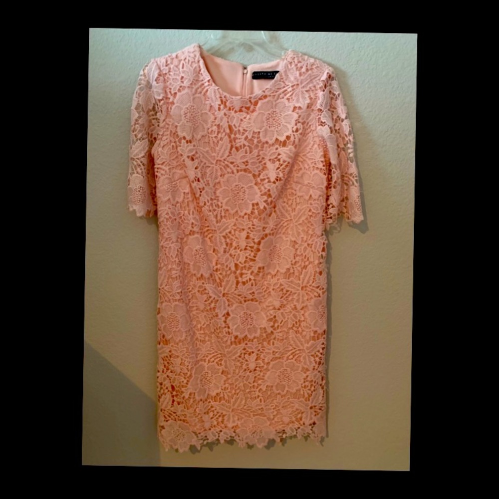 New floral crochet lace dress. Size 8-9 med Never worn. Soft and elegant look!!
